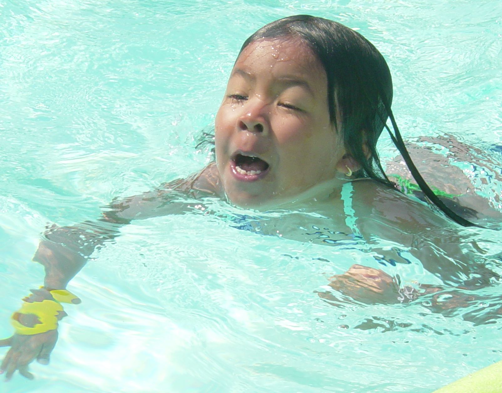 Young girl swimming